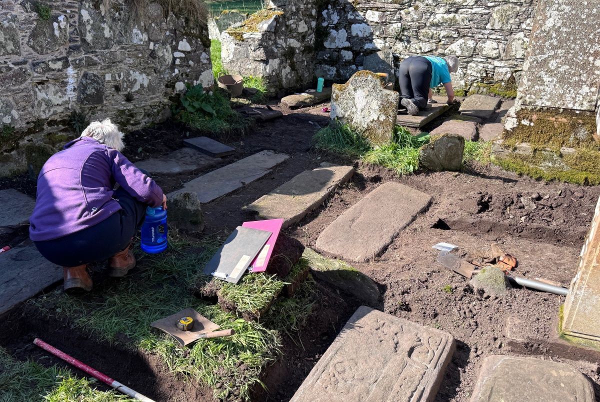 The team carefully cleared the floor of the chapel.