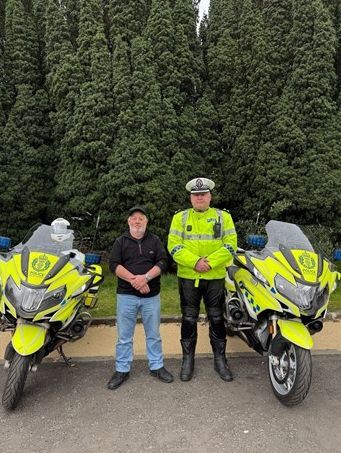 Ian Dominik with Inspector Ally Johnson from Police Scotland's National Motorcycle Unit. Photograph: Police Scotland Ian Dominik with Inspector Ally Johnson from Police Scotland's National Motorcycle Unit. Photograph: Police Scotland