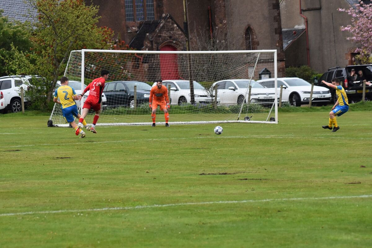 Southend keeper Fraser Mackenzie keeps his eyes on the ball as Shiskine prepares to attack. Southend keeper Fraser Mackenzie keeps his eyes on the ball as Shiskine prepares to attack.