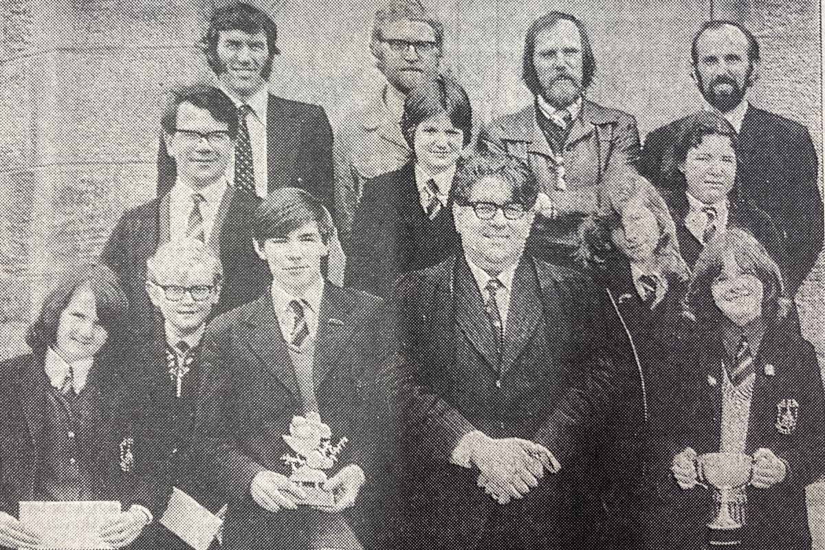 1975: Mr T. S. Twatt, rector, (centre) is flanked by the trophy winners who each swam 23 lengths in 10 minutes. 1975: Mr T. S. Twatt, rector, (centre) is flanked by the trophy winners who each swam 23 lengths in 10 minutes.