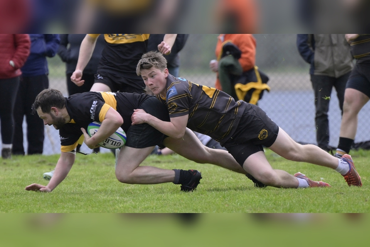 Mid Argyll's Callum Peterson makes a try-saving tackle on Steven Triall. Photograph: Iain Ferguson, alba.photos Mid Argyll's Callum Peterson makes a try-saving tackle on Steven Triall. Photograph: Iain Ferguson, alba.photos