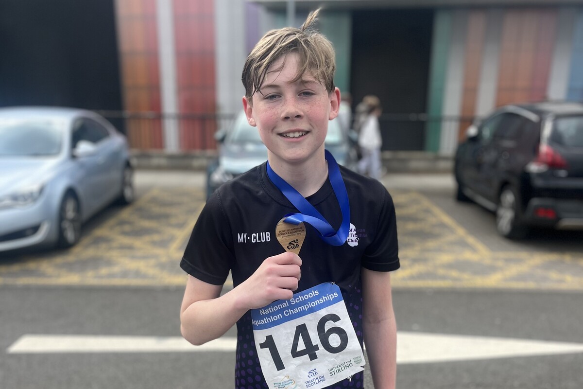 Mac McArdle swam 250 metres then transitioned to run two kilometres. Photograph: AJTC. Mac McArdle swam 250 metres then transitioned to run two kilometres. Photograph: AJTC.