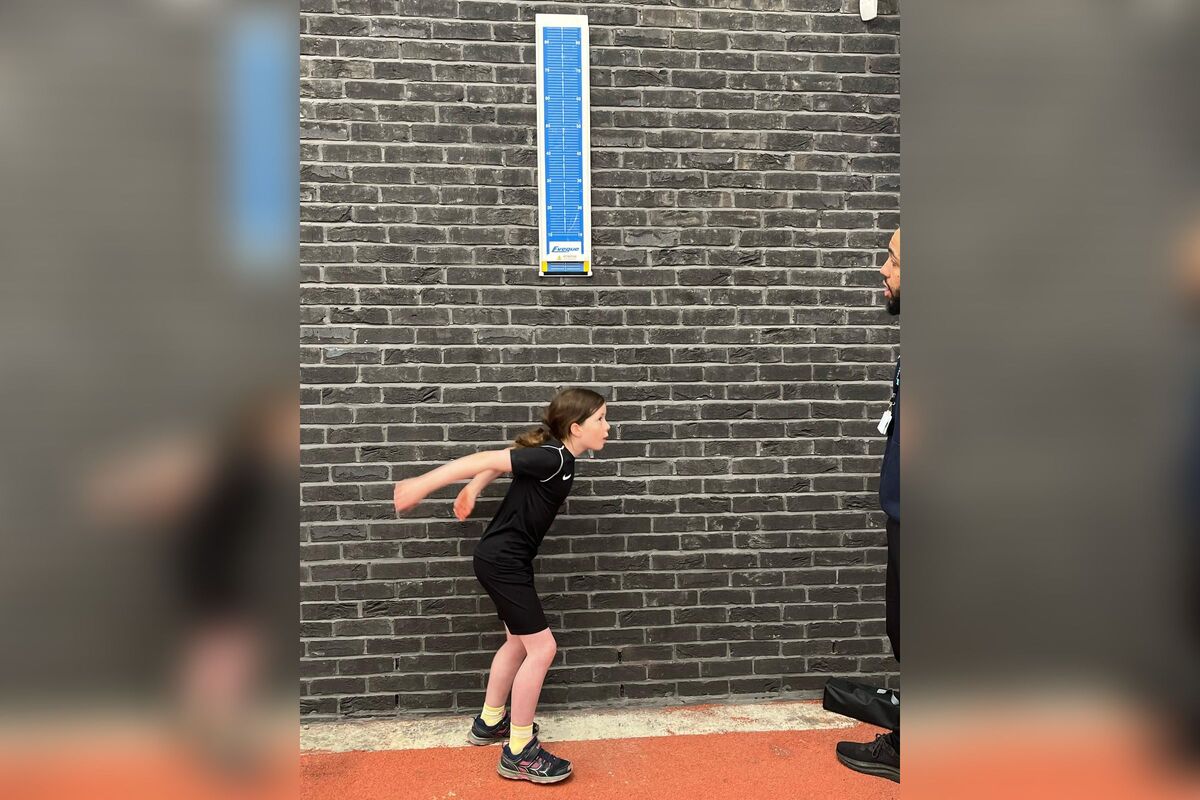 Fiona Dick jumping in the vertical jump. Photograph: Ross Dobson. Fiona Dick jumping in the vertical jump. Photograph: Ross Dobson.