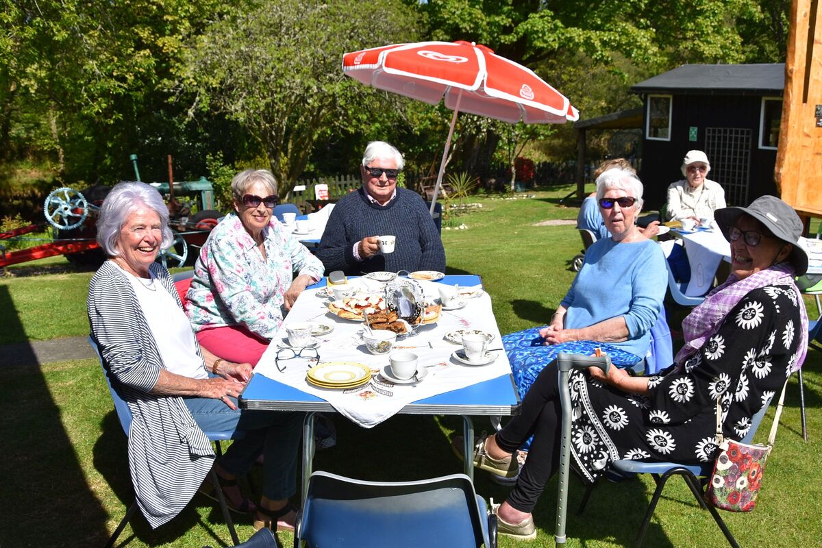 Guests enjoy the sunshine and afternoon tea at Arran Heritage Museum’s VE Day garden party. Guests enjoy the sunshine and afternoon tea at Arran Heritage Museum’s VE Day garden party.
