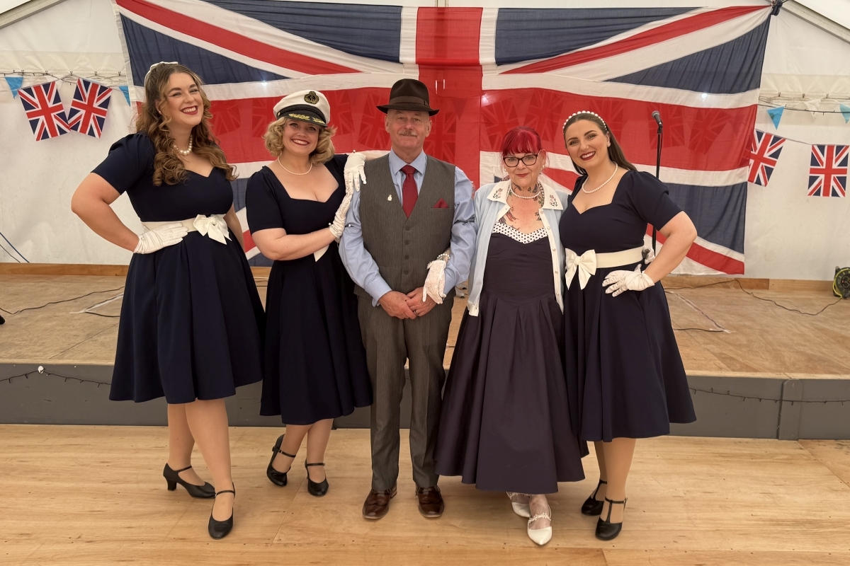 Aggie Dennis and his wife Jane with the Ragtime Dolls, who entertained at the VE80 tea party in Tarbert marquee. Aggie Dennis and his wife Jane with the Ragtime Dolls, who entertained at the VE80 tea party in Tarbert marquee.