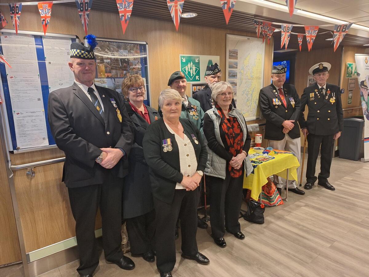 Members of the Saltcoats, Ardrossan and Stevenston branch of the Royal British Legion onboard MV Glen Sannox where VE Day was celebrated and those that were lost, remembered. Photograph: CalMac. Members of the Saltcoats, Ardrossan and Stevenston branch of the Royal British Legion onboard MV Glen Sannox where VE Day was celebrated and those that were lost, remembered. Photograph: CalMac.