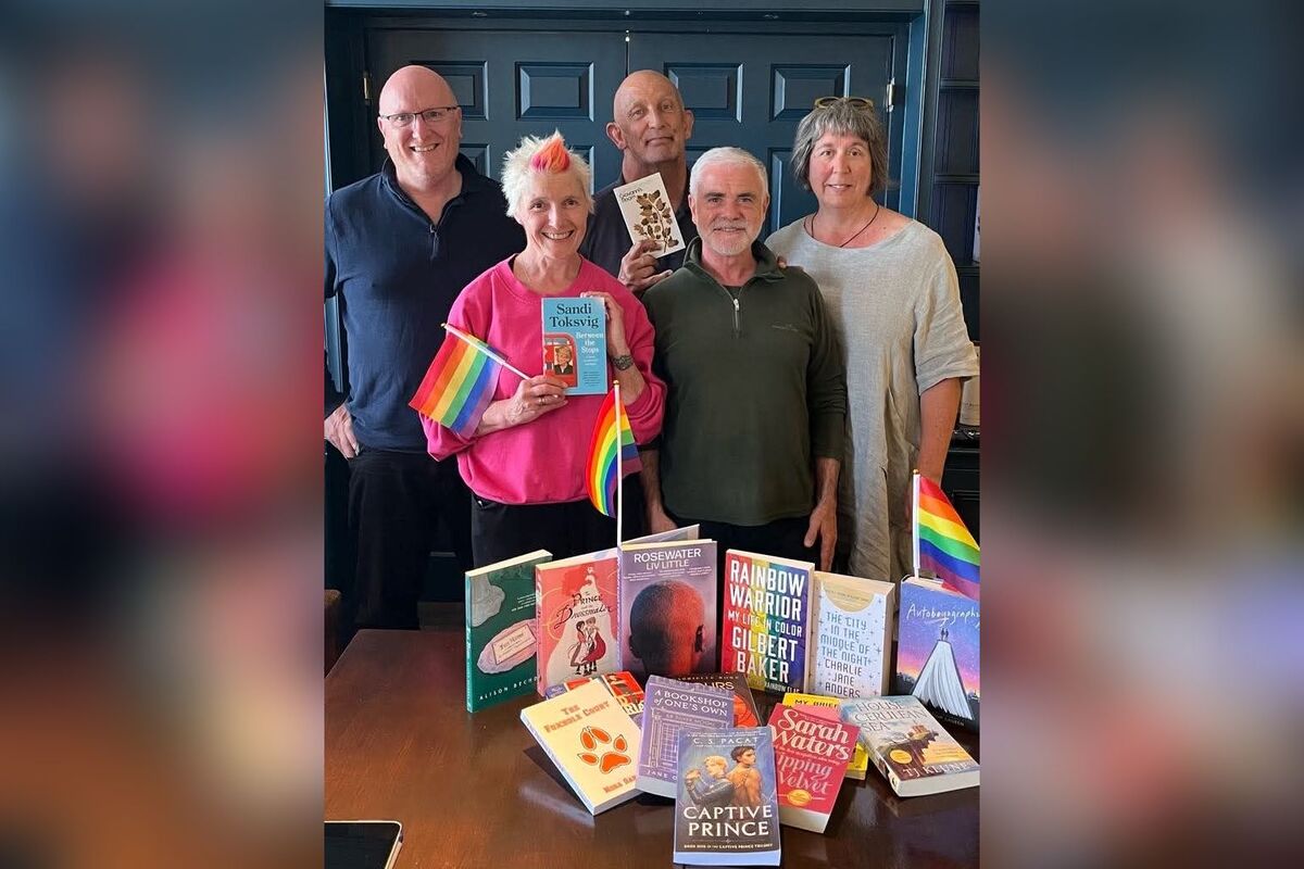 Arran pride participants march along Brodick Main Road during last year’s parade. Arran pride participants march along Brodick Main Road during last year’s parade.