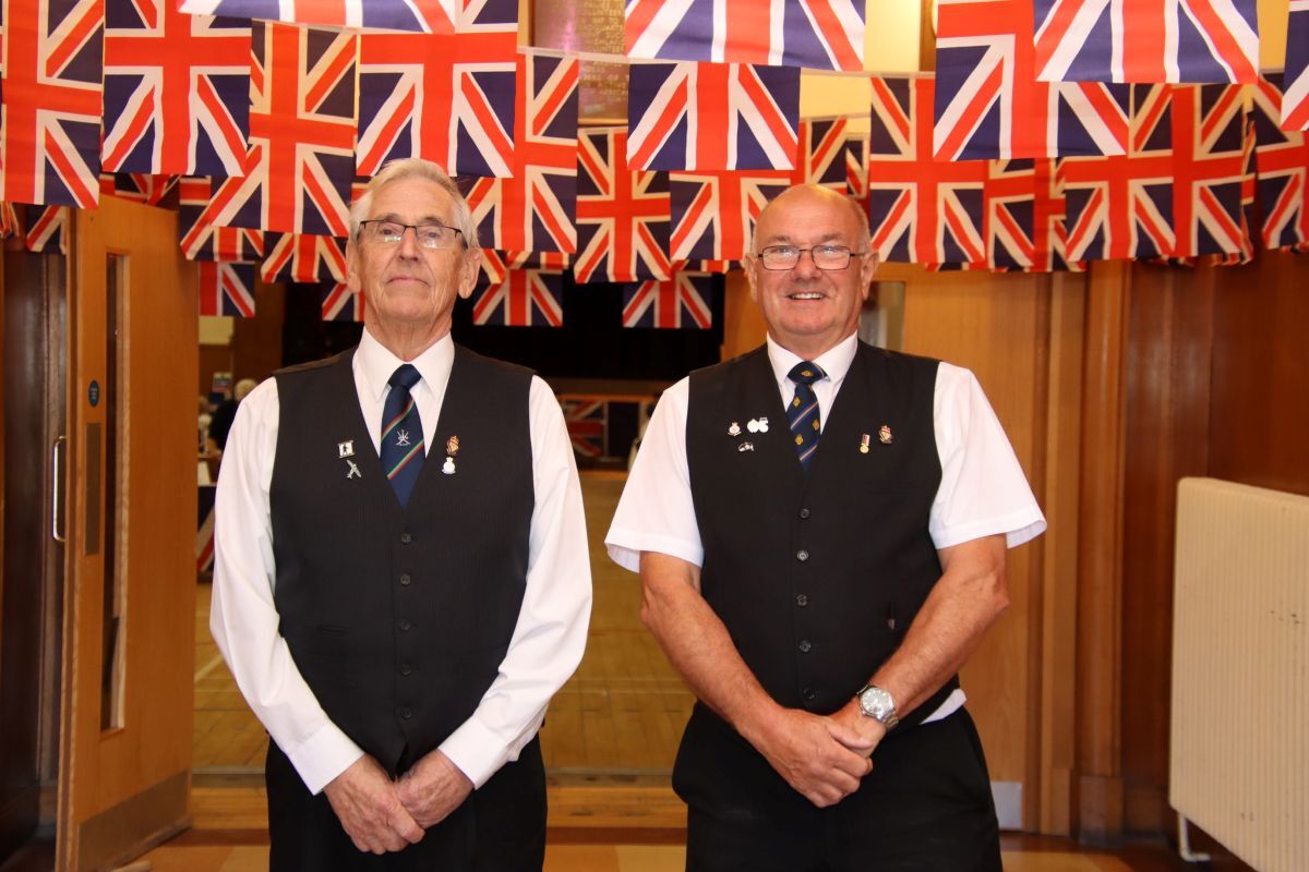Des Long and Jimmy Robertson welcoming people to the Victoria Hall. Des Long and Jimmy Robertson welcoming people to the Victoria Hall.