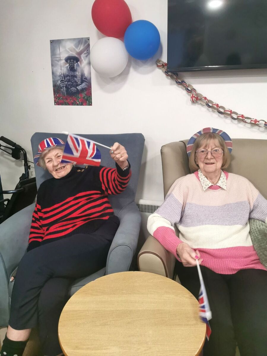 Kintyre Care Centre residents Ella McKinven and Elizabeth McNaughton flying their flags. Kintyre Care Centre residents Ella McKinven and Elizabeth McNaughton flying their flags.
