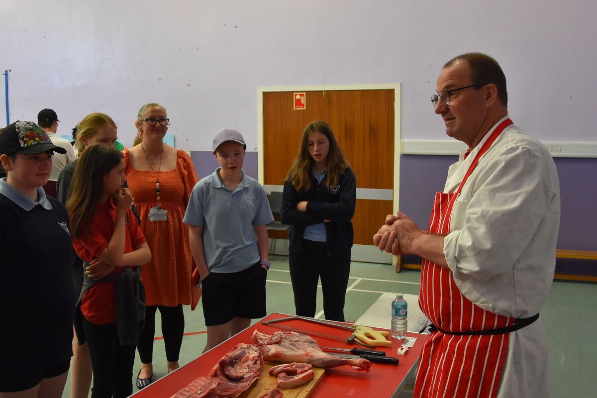 Butcher David McKinnon answered questions as he gave a small demonstration on the various cuts of lamb. Butcher David McKinnon answered questions as he gave a small demonstration on the various cuts of lamb.