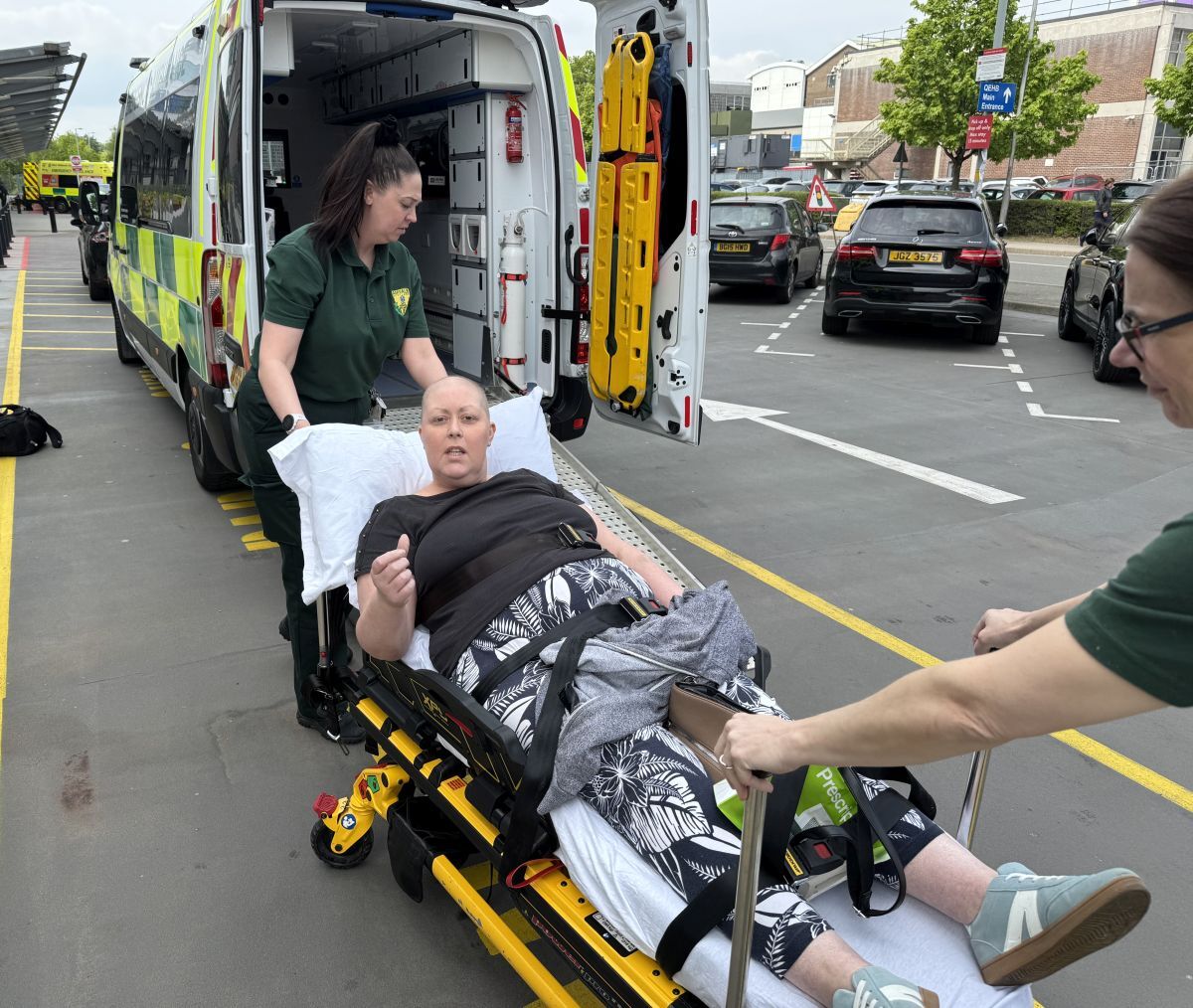 Claire Telfer giving the thumbs up a she leaves hospital in Birmingham ready for the private ambulance road trip home funded by wellwishers. Claire Telfer giving the thumbs up a she leaves hospital in Birmingham ready for the private ambulance road trip home funded by wellwishers.