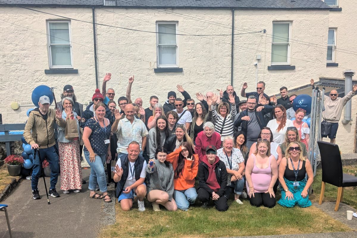 NO T23 Blue Triangle is 50 01 Staff and Supported People web NO T23 Blue Triangle is 50 01 Staff and Supported People web