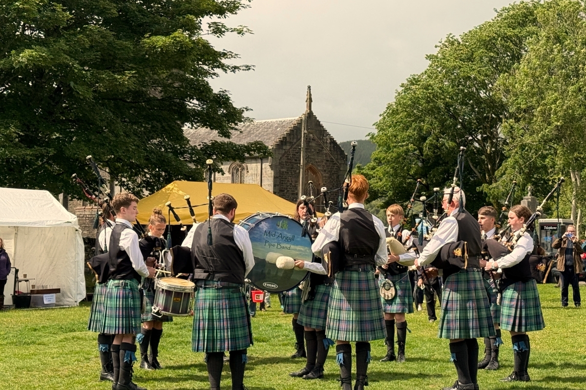 Mid Argyll Pipe Band takes centre stage on Kilmartin Green. Photograph: Aileen Gillies Mid Argyll Pipe Band takes centre stage on Kilmartin Green. Photograph: Aileen Gillies