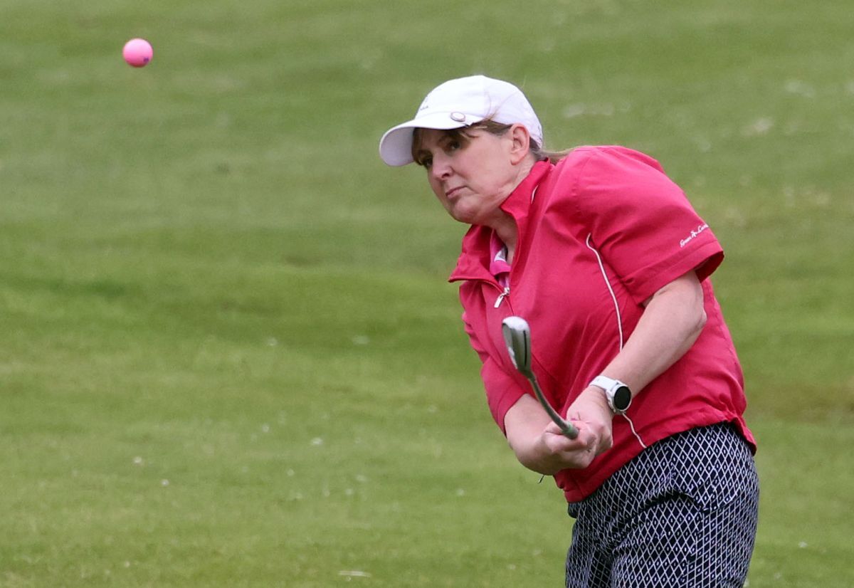 Christine Cameron playing for the Pink Ladies Chips on to the green. Photograph: Kevin McGlynn Christine Cameron playing for the Pink Ladies Chips on to the green. Photograph: Kevin McGlynn
