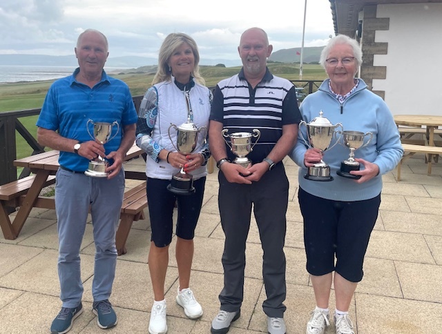 Shiskine Golf Club’s Duisky winner, Jim Brown; Ladies Champion Shona Weir; Gents Champion Gary Campbell and Elizabeth Kelso, Ladies Bronze Champion and winner of the Ladies Club Trophy. Photograph: SGTC. Shiskine Golf Club’s Duisky winner, Jim Brown; Ladies Champion Shona Weir; Gents Champion Gary Campbell and Elizabeth Kelso, Ladies Bronze Champion and winner of the Ladies Club Trophy. Photograph: SGTC.