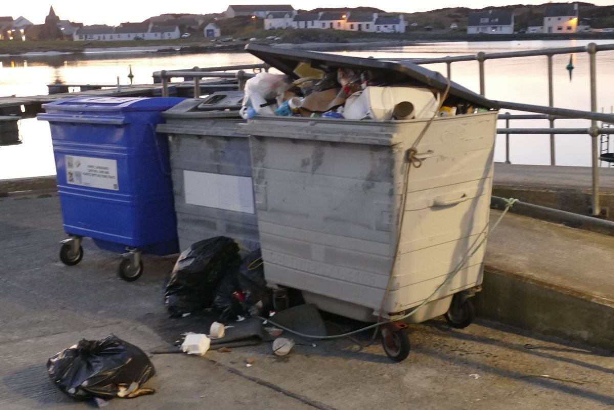 The removal of overflowing bins from public spaces has been questioned. The removal of overflowing bins from public spaces has been questioned.