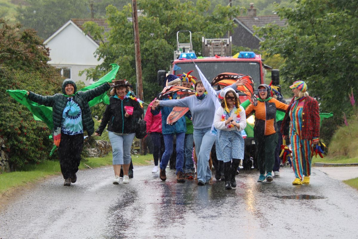 Not even a deluge of rain could dampen spirits during Saturday&rsquo;s parade.