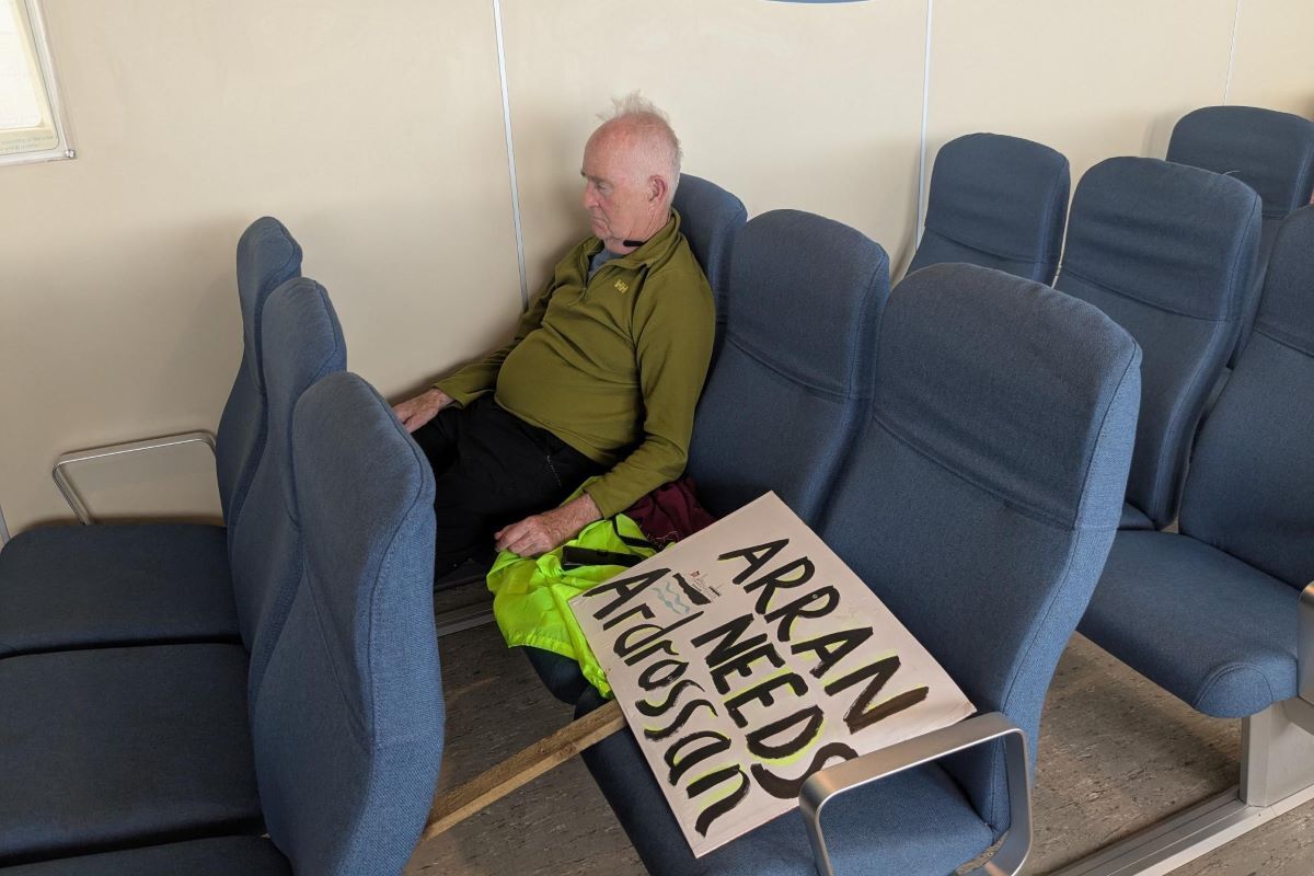 NO B26 Holyrood protest 03 Arran for Ardrossan Harbour A weary protestor returns web