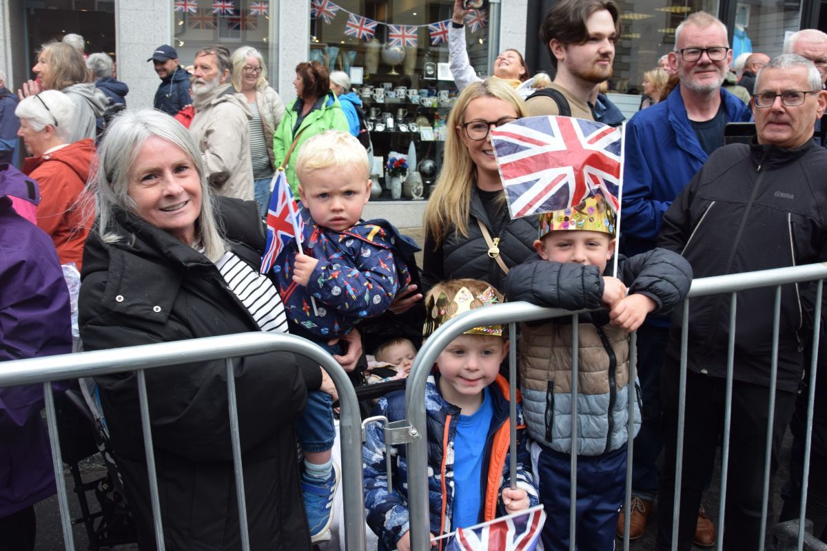 Little Ronnie Scally, Jacques Boyd and Freddie Boyd, waited to meet The King with Lorraine Gillespie and Kerry Scally, while Cora McLean napped in the pram, behind.