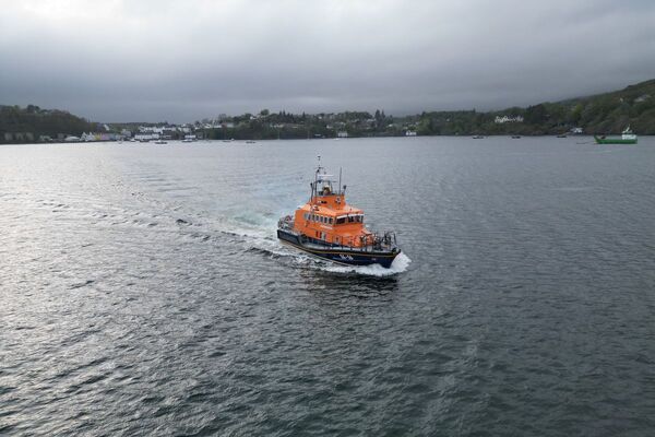 Portree RNLI launch to aid capsized dinghy