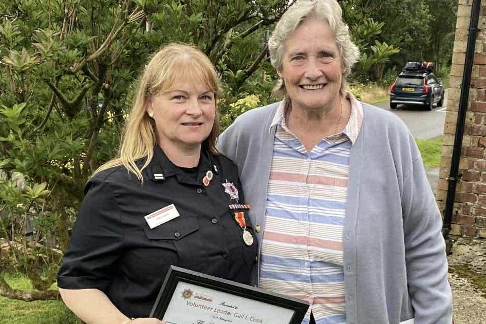Minard firefighter Gail Cook and Councillor Jan Brown at the celebration of Gail's 20-year long service medal. Photograph: Jan Brown