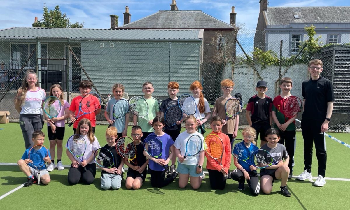 Coaches Tracey Brogan and Calum Scott with the primary four to seven age group.