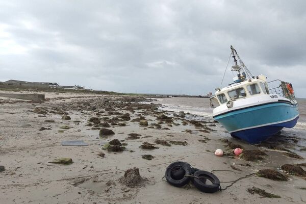 Community rallies to rescue Tayinloan fishing boat