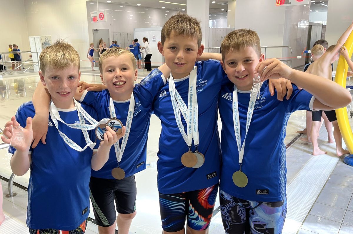 Thomas Millar, Jamie Burns, Archie McCorkindale and Robbie Cox with their North Ayrshire meet medals.