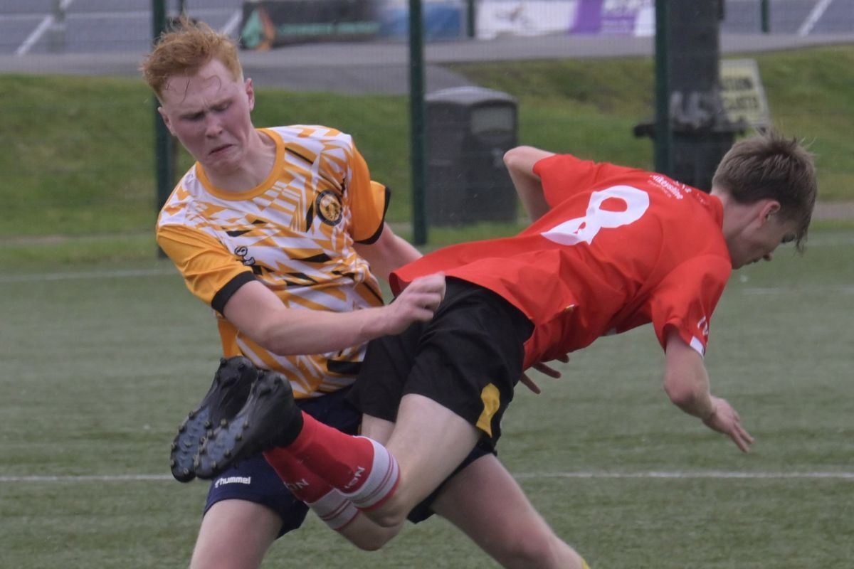 Depleted youth squad hold firm to the end