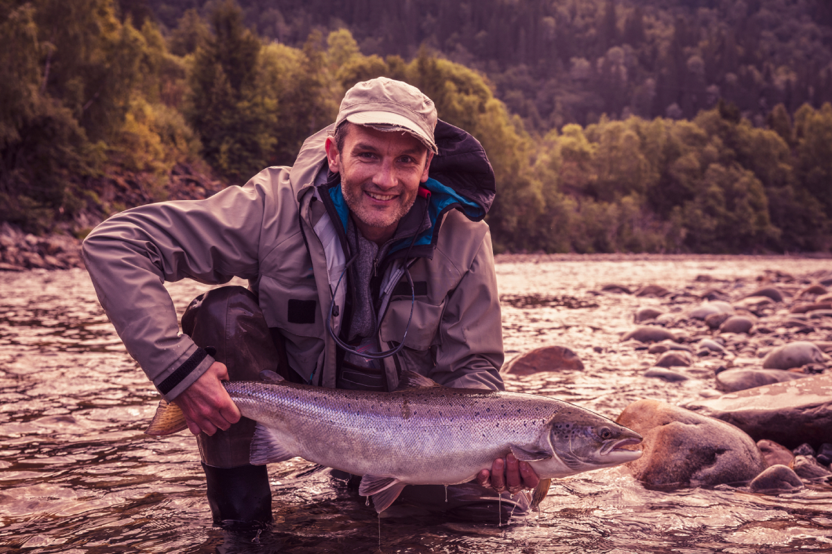 fly fisherman with salmon AdobeStock 838979735 20250908