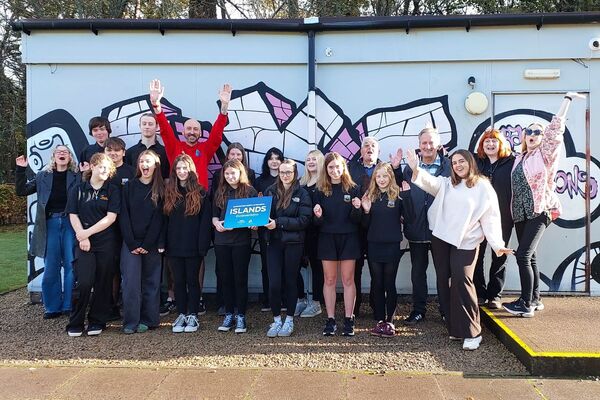 Island youth group celebrate ownership of building