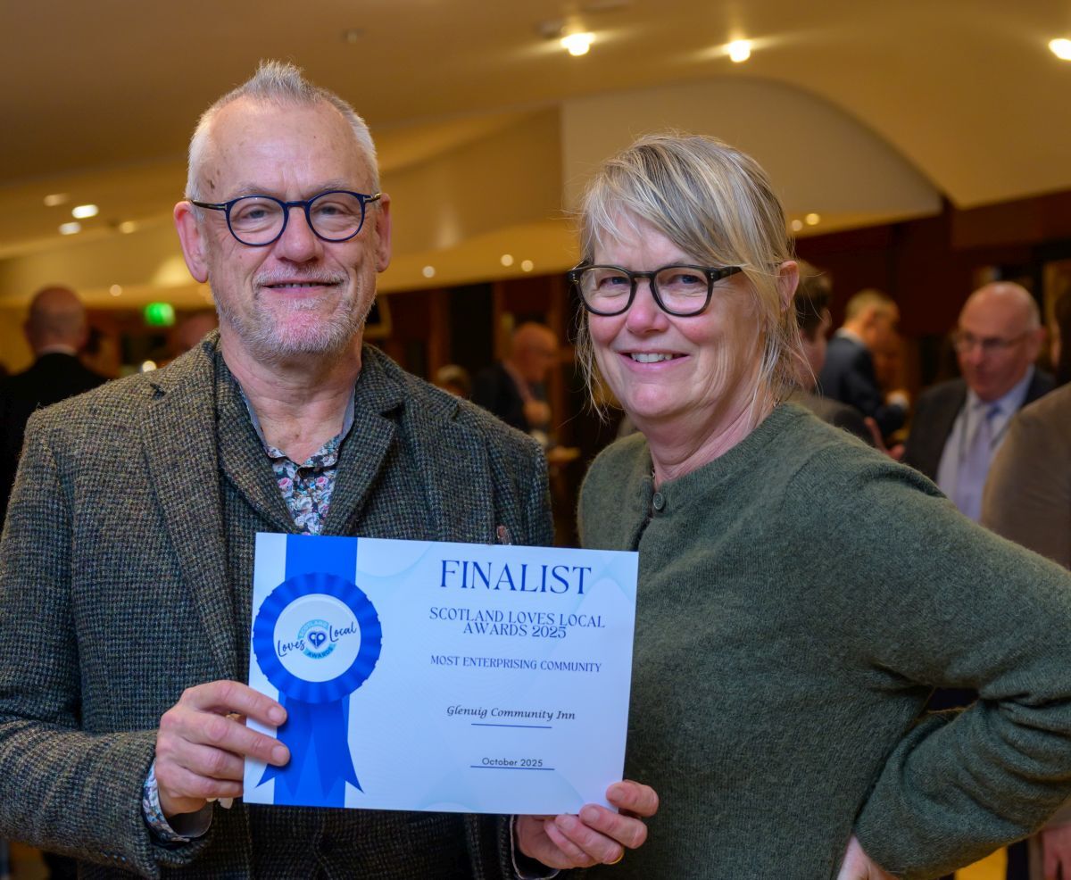 Malcolm Fleming, left, and Helen Lucas, representing Glenuig Community Inn at the Scottish Parliament Scotland Loves Local celebration