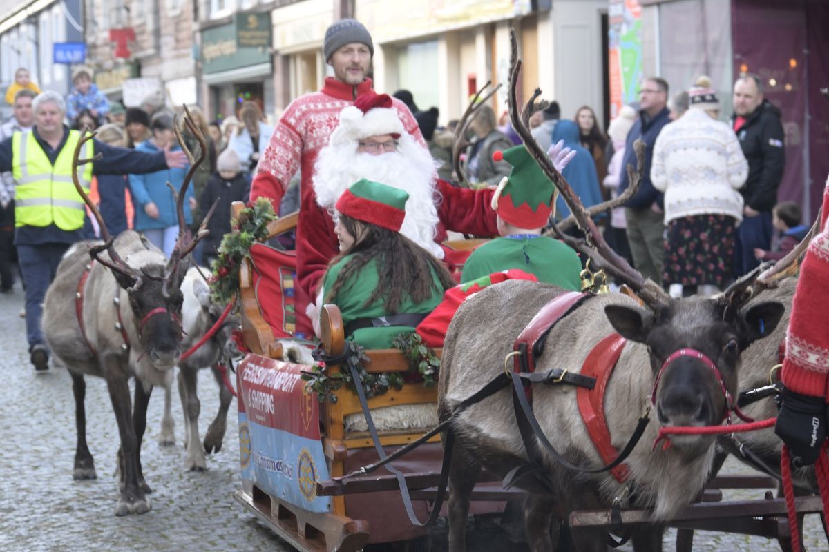 Cairngorm reindeer and Santa's elves lead the way to Rotary Christmas Festival