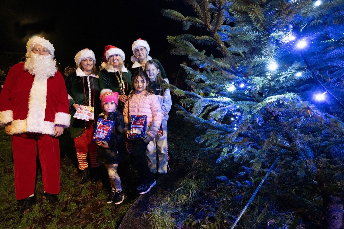 Santa, his helpers and winners of the painting competition around the Christmas tree at Upper Achontore in 2024. Photograph: Iain Ferguson, alba.photos. Santa, his helpers and winners of the painting competition around the Christmas tree at Upper Achontore in 2024. Photograph: Iain Ferguson, alba.photos.