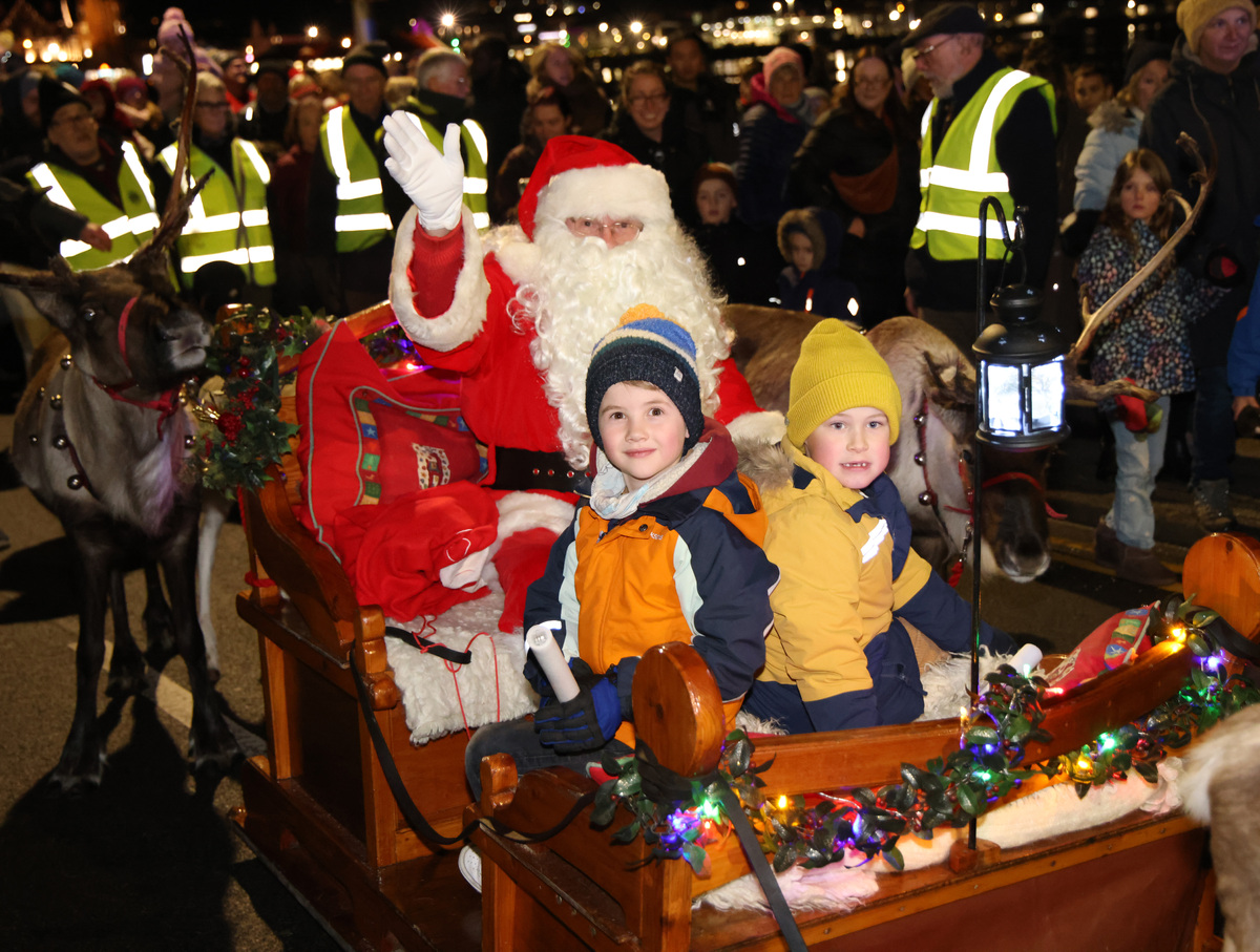 no t49 Henry D Griffiths p3 Arinagour Primary School and Tom Nicholson P3 Park primary winners of the junior christmas card design get to ride in the sleigh with santa along the corran esplanade