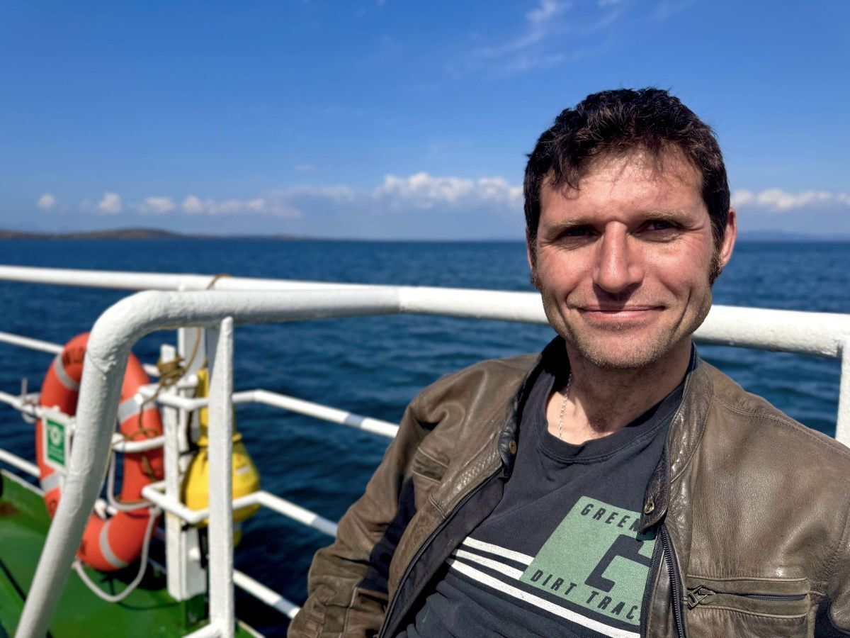 Guy enjoying the ferry crossing to Gigha ahead of his stint as a dairy farmer. Photograph: UKTV/North One. Guy enjoying the ferry crossing to Gigha ahead of his stint as a dairy farmer. Photograph: UKTV/North One.