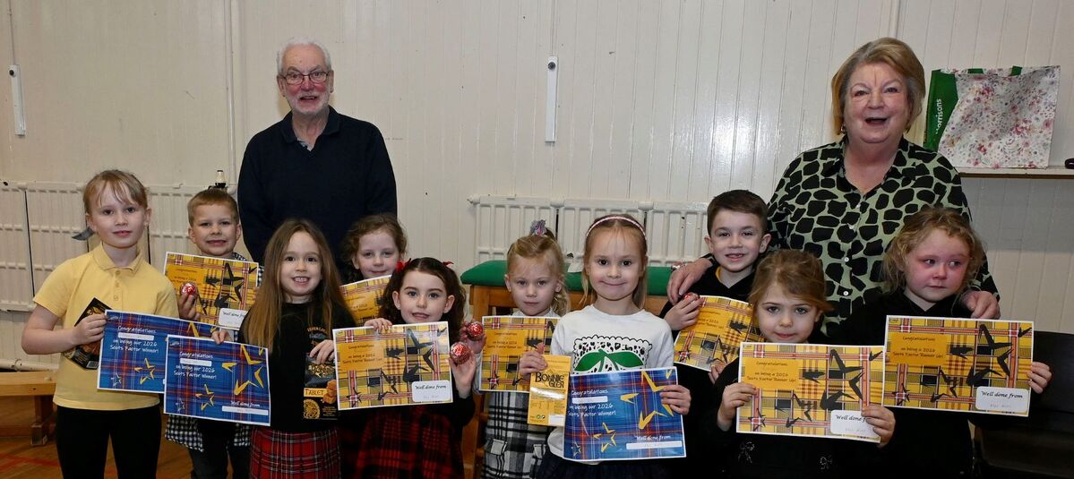 Winners and runners-up of Classes 1-3 who took part in the Inverlochy Primary Scots Factor poetry recital with judges Iain Ferguson of Lochaber Life and former teacher Mairi Finlayson. Photograph Tanya Ross. Winners and runners-up of Classes 1-3 who took part in the Inverlochy Primary Scots Factor poetry recital with judges Iain Ferguson of Lochaber Life and former teacher Mairi Finlayson. Photograph Tanya Ross.