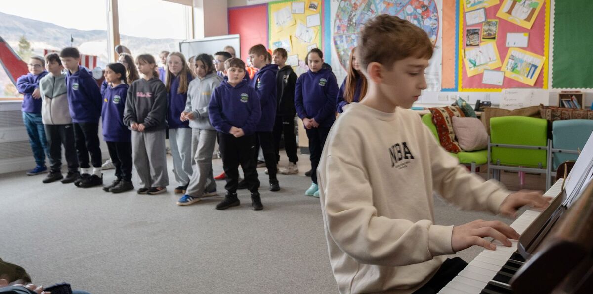 David Calaver played Auld Lang Syne on the piano at Lundavra Primary School's Burns' celebration. Photograph: Iain Ferguson, alba.photos.