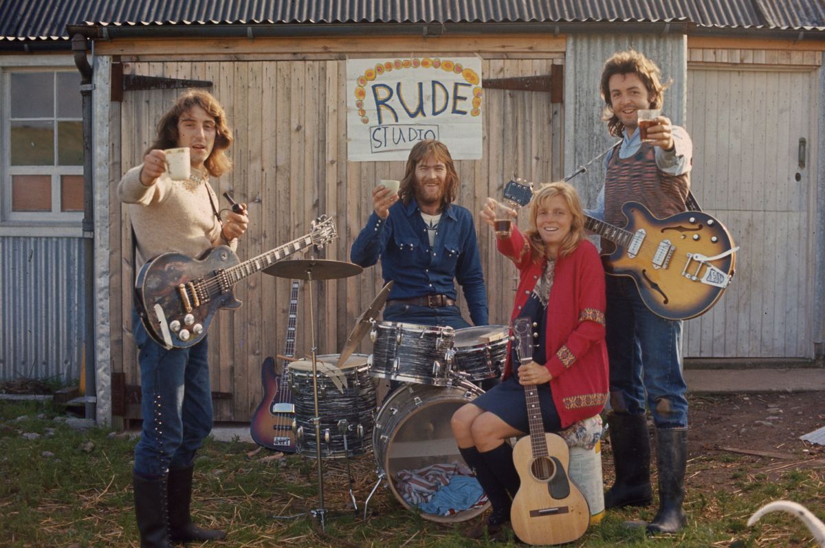 Sir Paul and Linda McCartney with Wings bandmates outside &lsquo;Rude Studio&rsquo; at High Park Farm. Photograph: Linda McCartney.