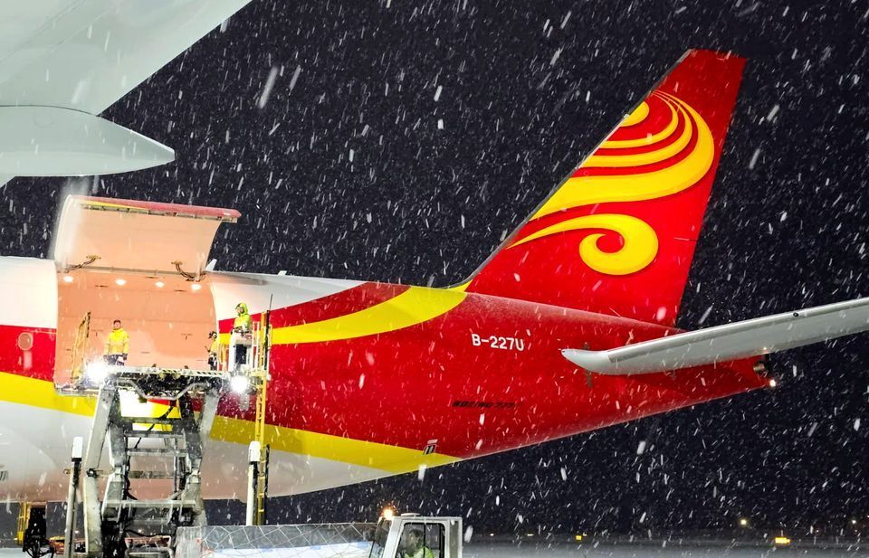 Suparna Airline loading salmon up in snow