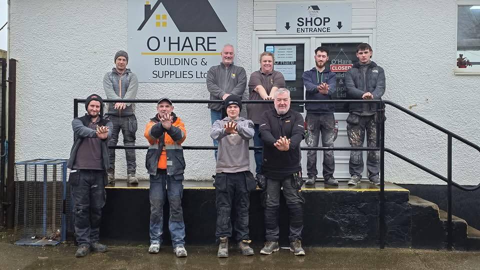 The team at O&rsquo;Hare Building and Supplies show off their CPR skills. Photograph: Fiona Laing.