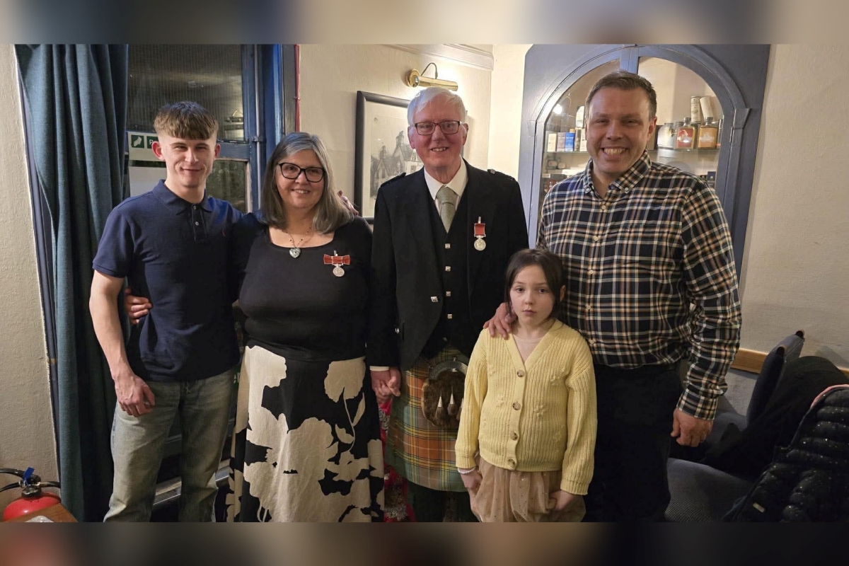 Mid Argyll couple celebrate BEM ceremony with pipe band friends and family