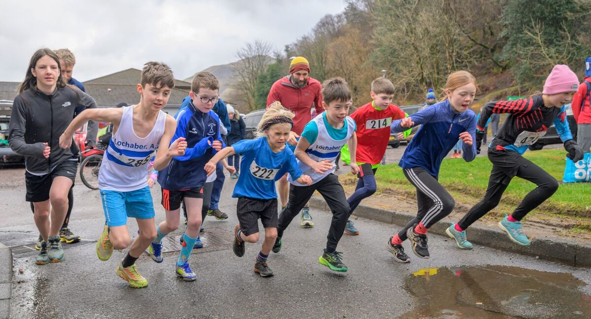Lochaber Athletic Club Juniors take off for their Leisure Centre Leap. Photograph: Phil Hughes.