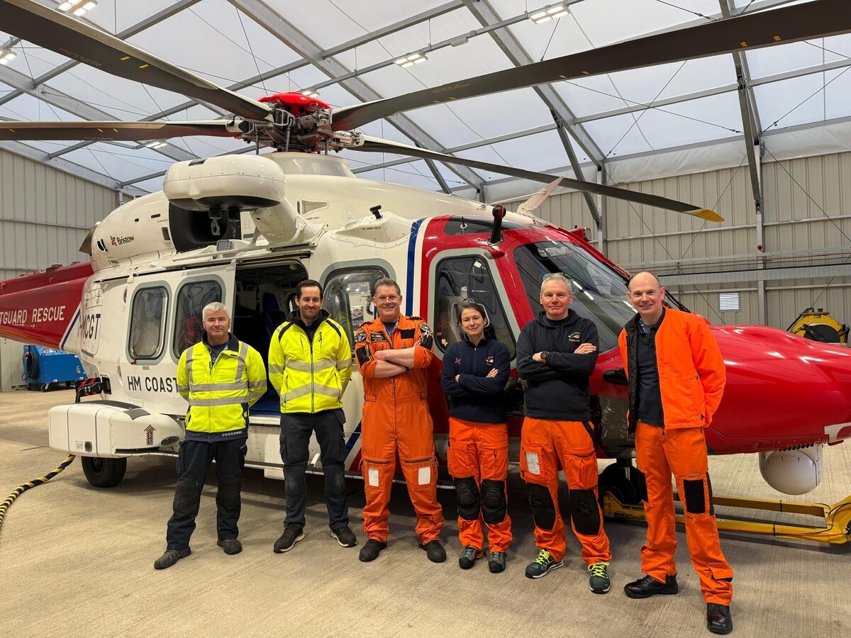 The Oban HM Coastguard team with a specialist AgustaWestland 89 helicopter. Photograph: Bristow Group.