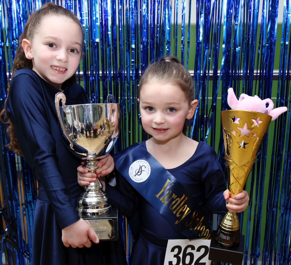  Irish dancing sisters Lottie and Penny Newbigging raise championship stakes...and trophies. Photograph: Kevin McGlynn