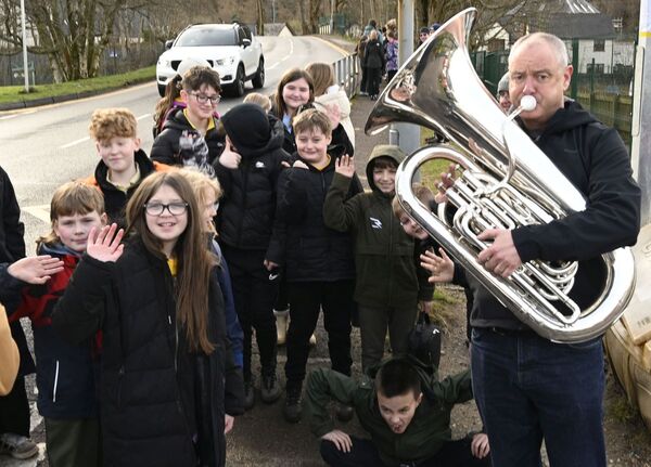 Blowing the trumpet for school's sponsored walk