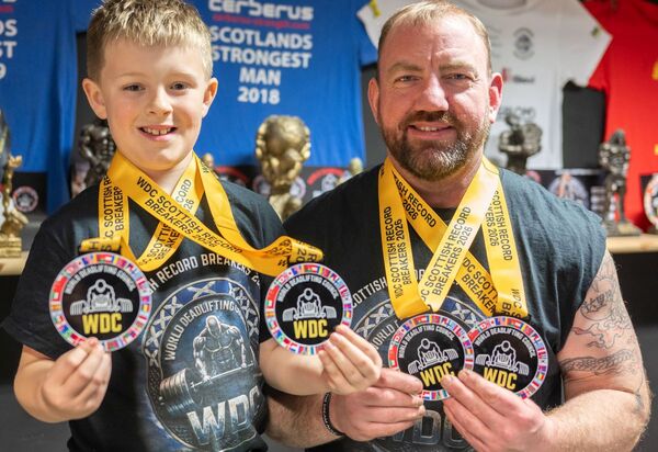 Father and son lift Scottish records