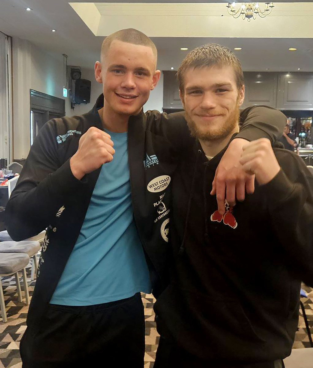 Anton Bodkin. on the left, applauds fellow boxer Jamie McQuade after their exhibition bout. Photograph supplied by Anton's family.