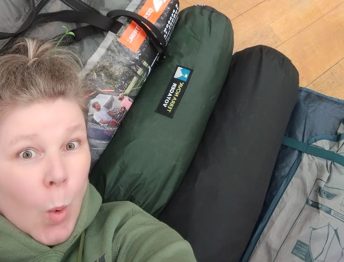 Merriol Baldwin with a few of the 17 tents his family have collected so far for future re-purposing - and to keep scenic GlenCoe free of abandoned campers' kit. Photograph: Merriol Baldwin