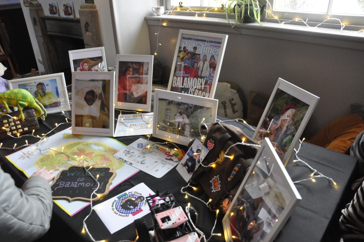 ow t17 display table of props and photos from the balamory set